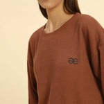 Oversized Waffle Knit Round Neck T-Shirt | Coffee Brown | Woman, showcasing relaxed fit and waffle knit texture.