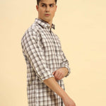 Three-quarter profile of the Men's White & Brown Aeternum Checked Cotton Shirt highlighting the refined tailored fit.