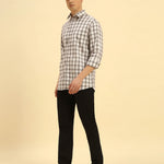 Full body view of the Aeternum Men's Checked Cotton Shirt styled with dark trousers for a smart-casual look.