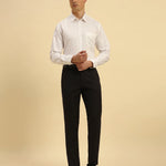 Full body view of the Aeternum Men's White Supima Cotton Shirt styled with black trousers for a formal look.