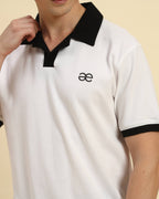 Close-up of the button placket and breathable cotton texture on the Aeternum Men's White Polo.