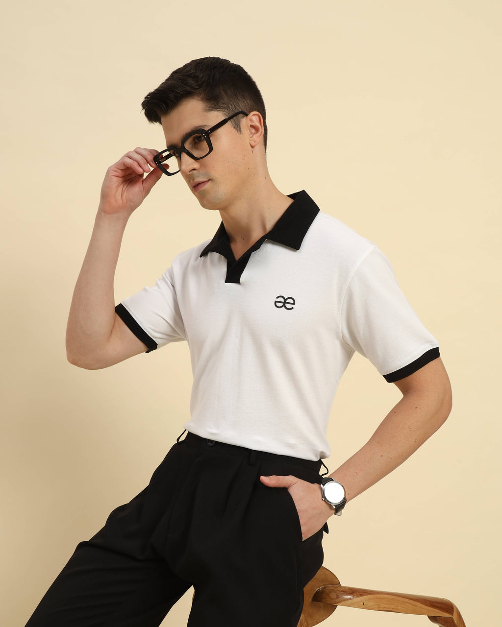 Dynamic lifestyle view of the Men's Premium Classic Fit Cotton Polo in White