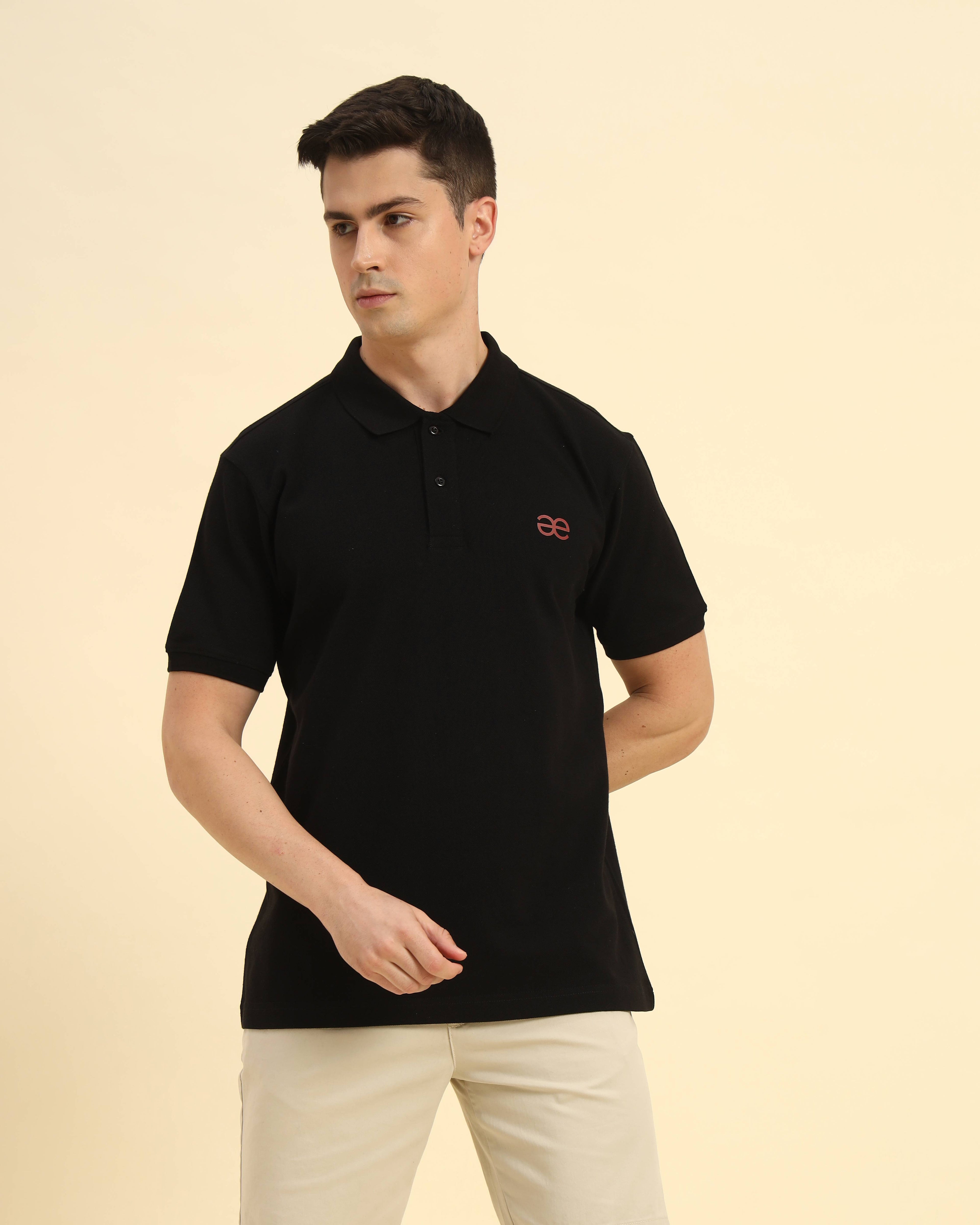 Front view of the Black Premium Classic Fit Cotton Polo on model, demonstrating a sophisticated casual look