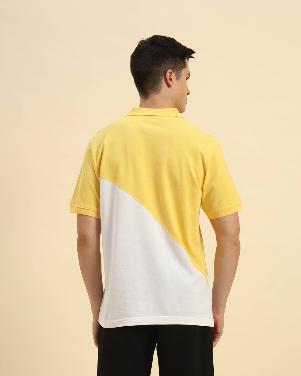 Back view of the Aeternum Men's Yellow & White Cotton Polo demonstrating the clean, structured silhouette.