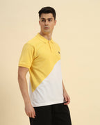 Three-quarter profile of the Men's Yellow & White Aeternum Cotton Polo highlighting the crisp collar and premium piqué fabric.