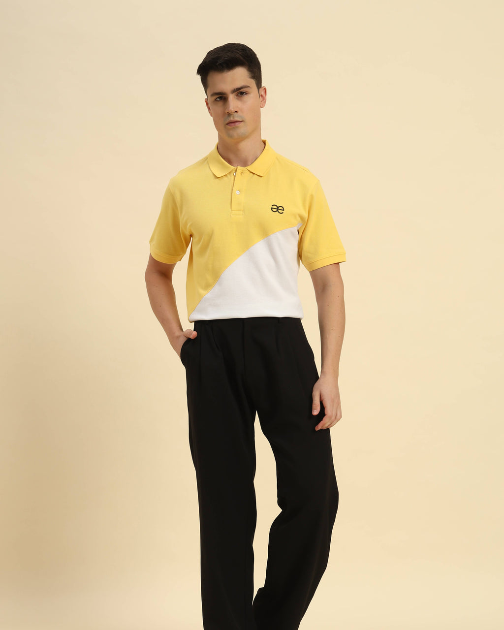 Model wearing the Yellow & White Premium Classic Fit Cotton Polo styled with dark trousers - Men's casual athletic look.