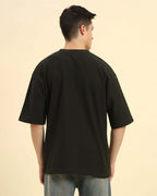 Back view of the Aeternum Men's Oversized Jacquard T-Shirt in Dark Green, demonstrating the clean and loose fit.