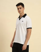 Side view of the Aeternum Men's White Cotton Polo showcasing the refined sleeve length and classic fit.