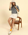 Woman wearing AE oversized French terry t-shirt for women in dark grey with a casual outfit.