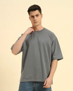 Aeternum Men's Oversized French Terry Crew Neck T-Shirt in Dark Grey - Front view showing the relaxed, contemporary fit.