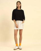 Aeternum Women's Oversized T-Shirt in black, showcasing minimalist style and comfort.