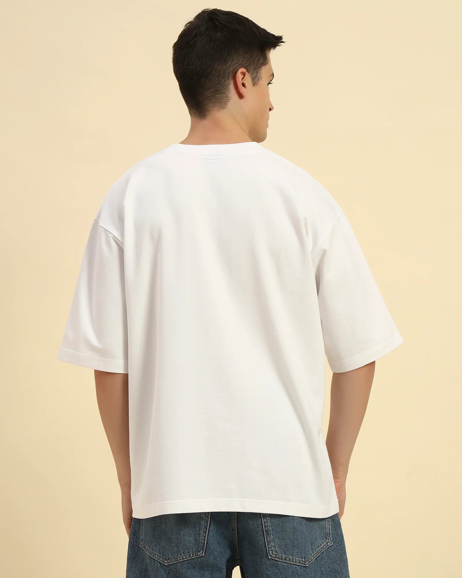 Back view of the Aeternum Men's White French Terry T-Shirt demonstrating the structured, oversized cut.