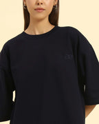 Close-up of the crew neckline and premium French terry texture on the Aeternum Women's Navy Blue T-Shirt