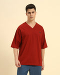 Aeternum Men's Oversized Cotton Slub V-Neck T-Shirt in Red - Front view showing the relaxed fit and unique slub cotton texture.