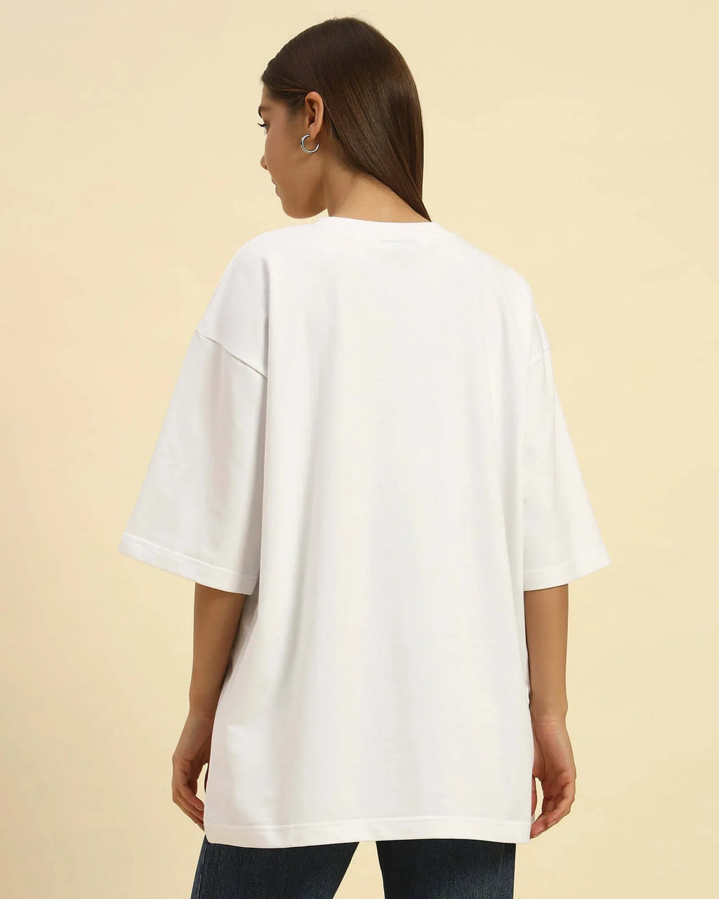 AE Oversized French Terry Crew Neck T-Shirt | White | Woman - Back view of a model wearing oversized white tee.