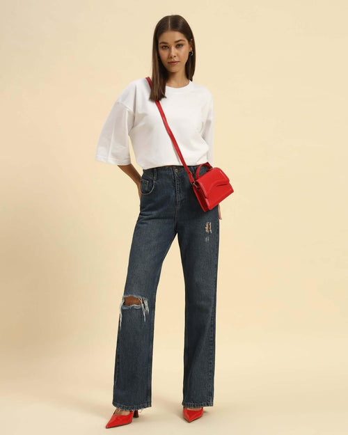 AE Oversized French Terry Crew Neck T-Shirt | White | Woman worn with ripped jeans and a red handbag.