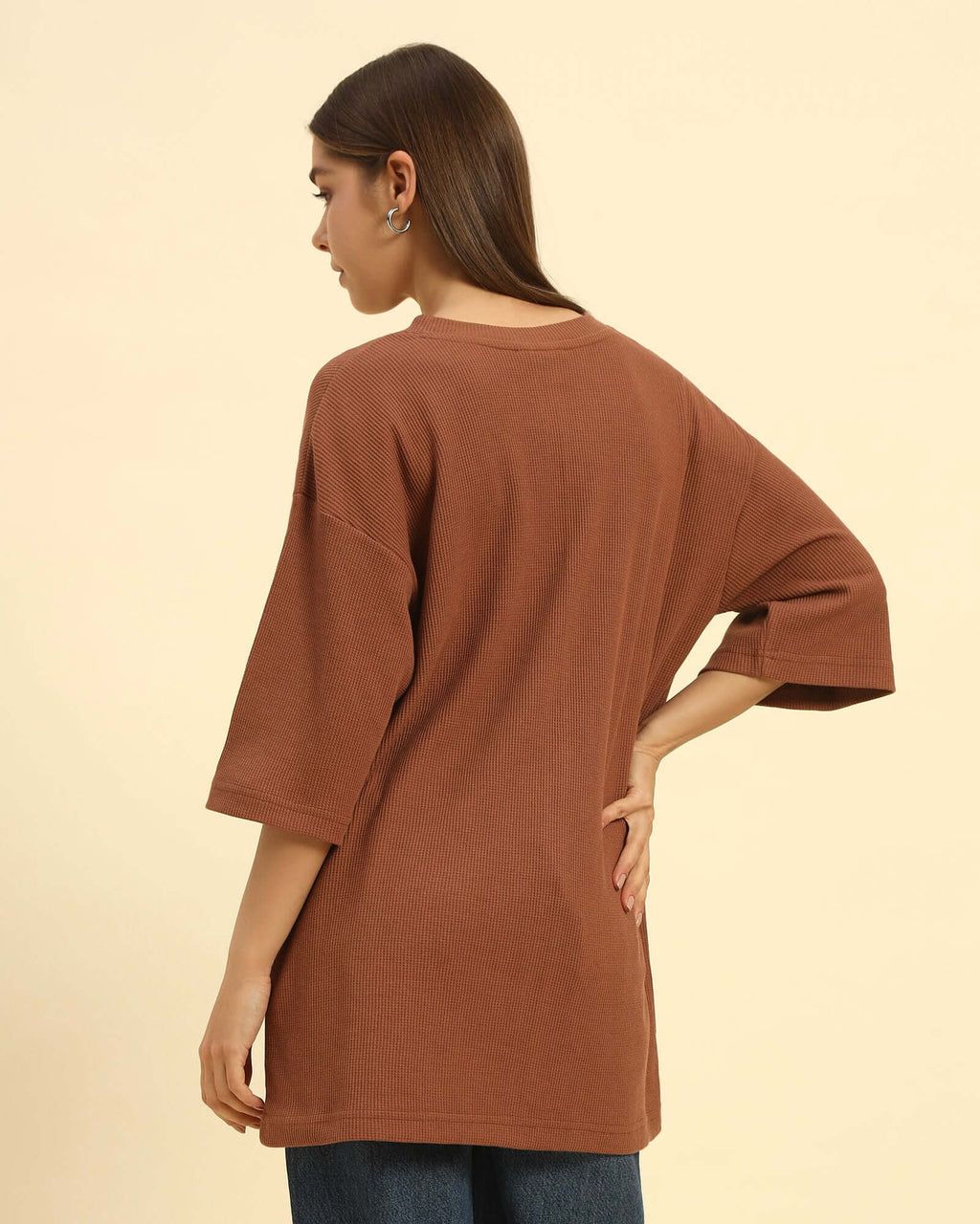 Oversized Waffle Knit Round Neck T-Shirt | Coffee Brown | Woman, back view showcasing relaxed fit and texture.