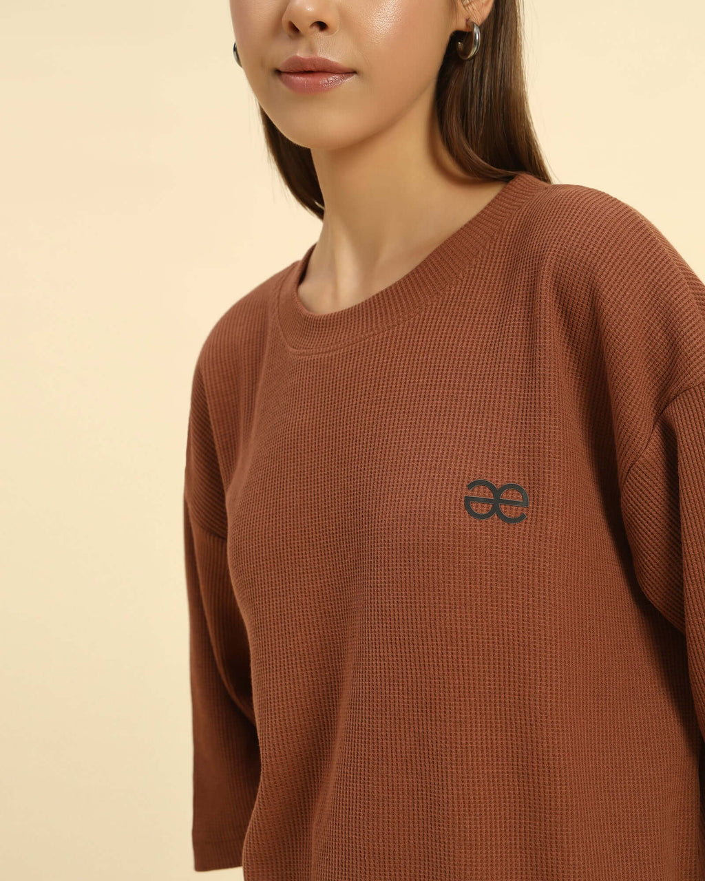 Oversized Waffle Knit Round Neck T-Shirt | Coffee Brown | Woman, showcasing relaxed fit and waffle knit texture.