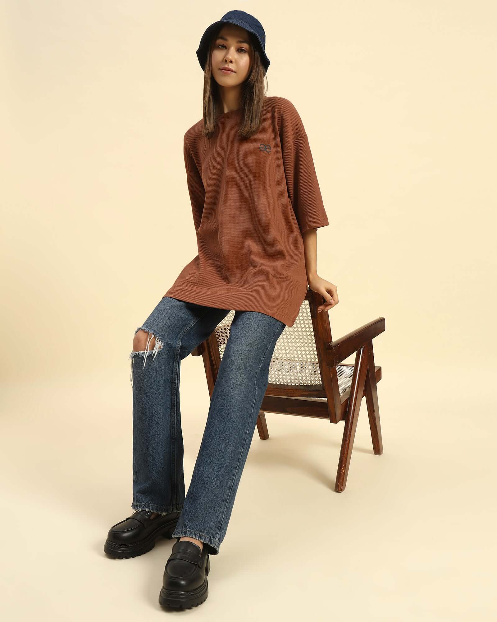 Oversized Waffle Knit Round Neck T-Shirt | Coffee Brown | Woman worn with casual jeans and a bucket hat.