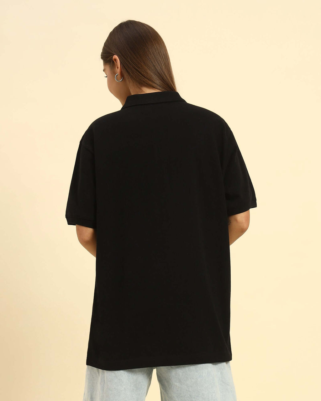 Back view of the AAeternum Women's Black Cotton Polo demonstrating the clean, classic fit