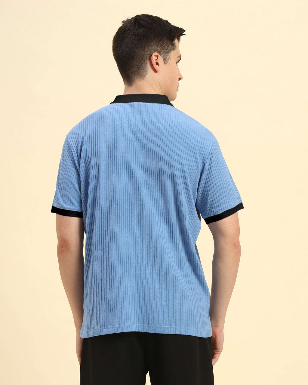Back view of the Aeternum Men's Sky Blue Rib Knit Polo demonstrating the clean, classic silhouette.
