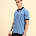 Three-quarter profile of the Men's Sky Blue Aeternum Rib Knit Polo highlighting the structured collar and premium texture.