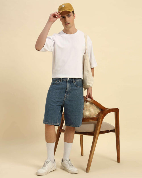 Lifestyle view of the Men's White Oversized French Terry T-Shirt, showcasing its versatile and comfortable design.
