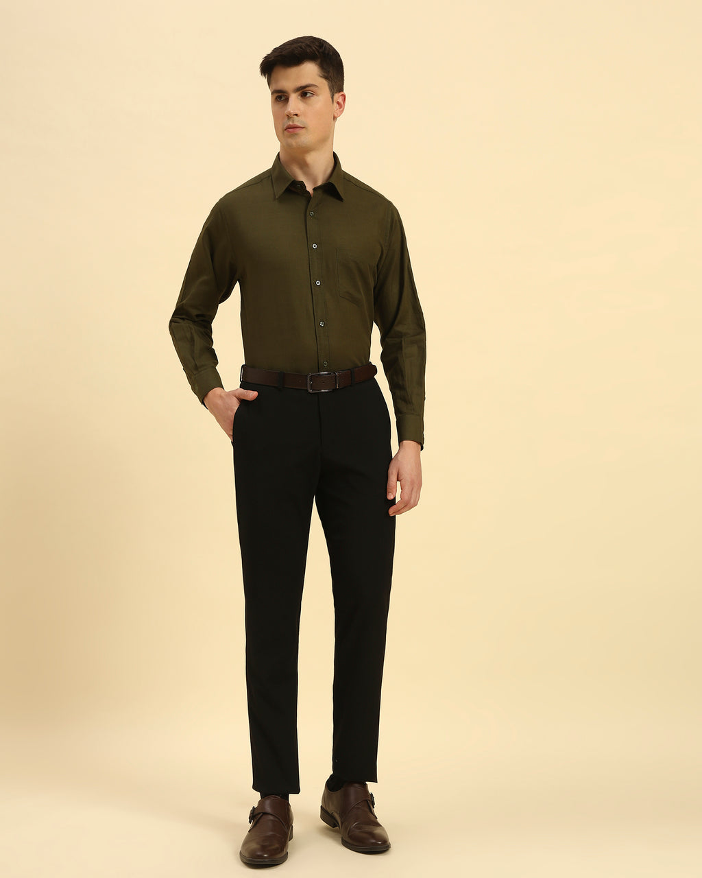 Full body view of the Dark Green Aeternum Relaxed Fit Italian Shirt styled with black trousers for a modern, refined look.