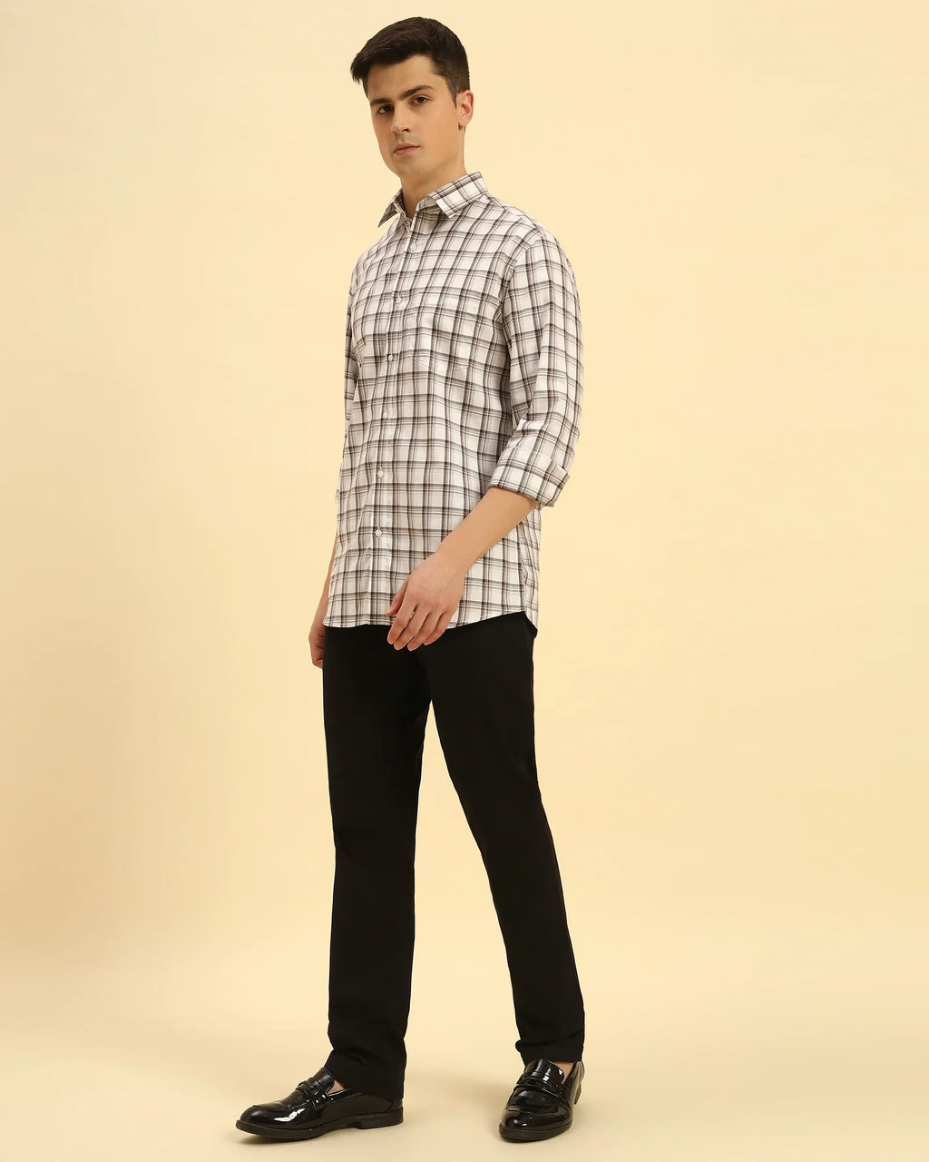 Full body view of the Aeternum Men's Checked Cotton Shirt styled with dark trousers for a smart-casual look.
