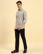 Full body view of the Aeternum Men's Checked Cotton Shirt styled with dark trousers for a smart-casual look.