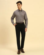 Full body view of the Aeternum Men's Dark Grey Giza Cotton Shirt styled with black trousers for a sharp, modern look.