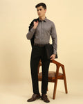 Model seated wearing the Aeternum Men's Classic Fit Belgium Giza Cotton Shirt, showcasing its professional and versatile aesthetic.