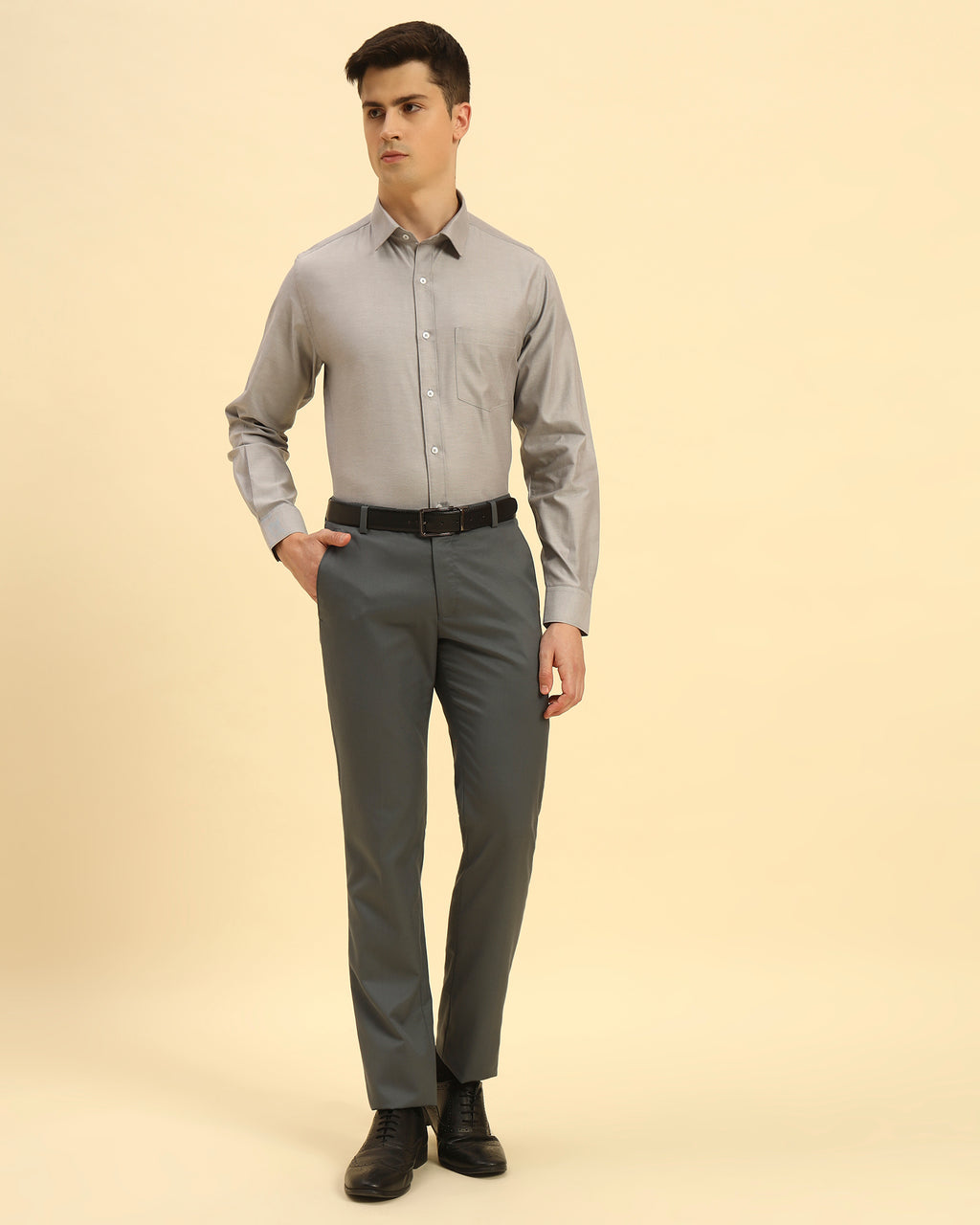 Full body view of the Aeternum Men's Grey Cotton-Blend Shirt styled for a modern smart-casual aesthetic.