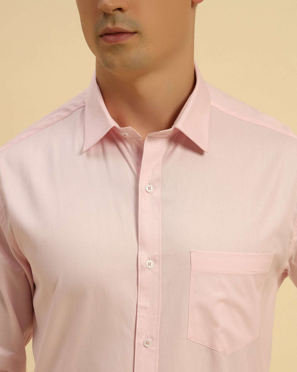 Close-up of the pointed collar and premium woven texture on the Aeternum Men's Light Pink Cotton Shirt.