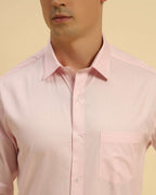 Close-up of the pointed collar and premium woven texture on the Aeternum Men's Light Pink Cotton Shirt.