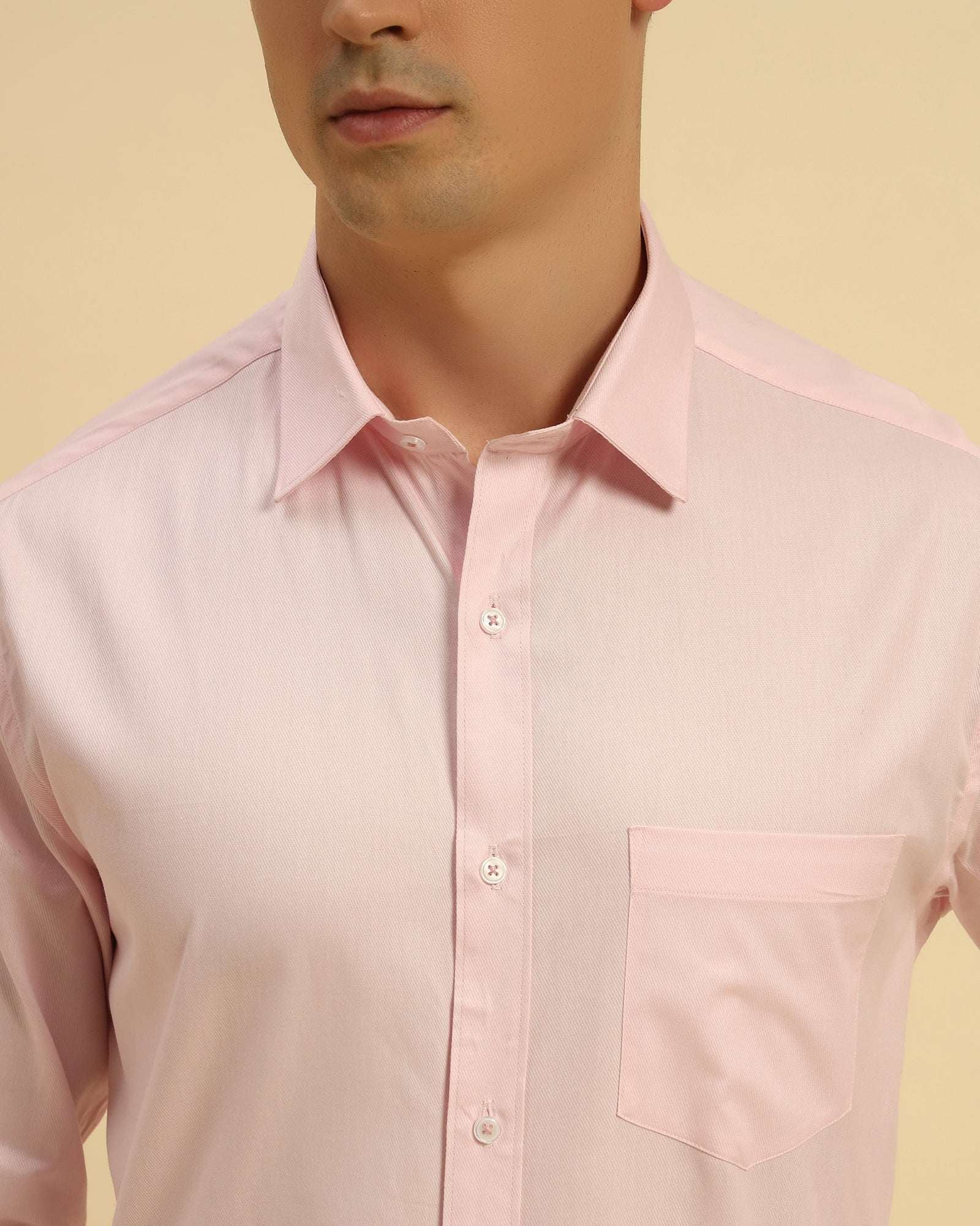 Close-up of the pointed collar and premium woven texture on the Aeternum Men's Light Pink Cotton Shirt.