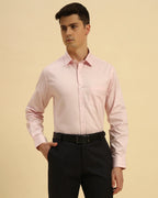 Three-quarter profile of the Men's Light Pink Aeternum Textured Cotton Shirt highlighting the refined button-down construction