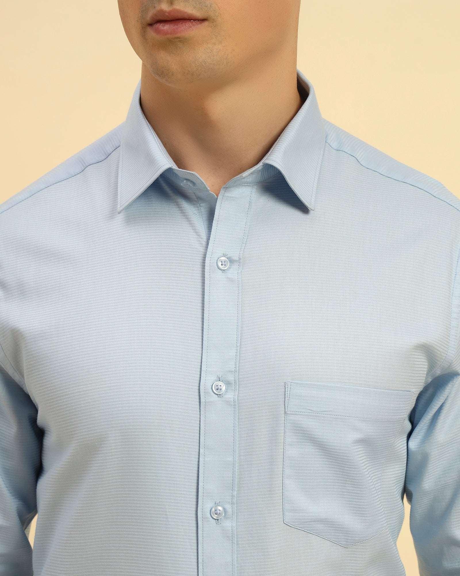 Close-up of the collar and fine corded weave on the Aeternum Men's Sky Blue Cotton-Blend Shirt.