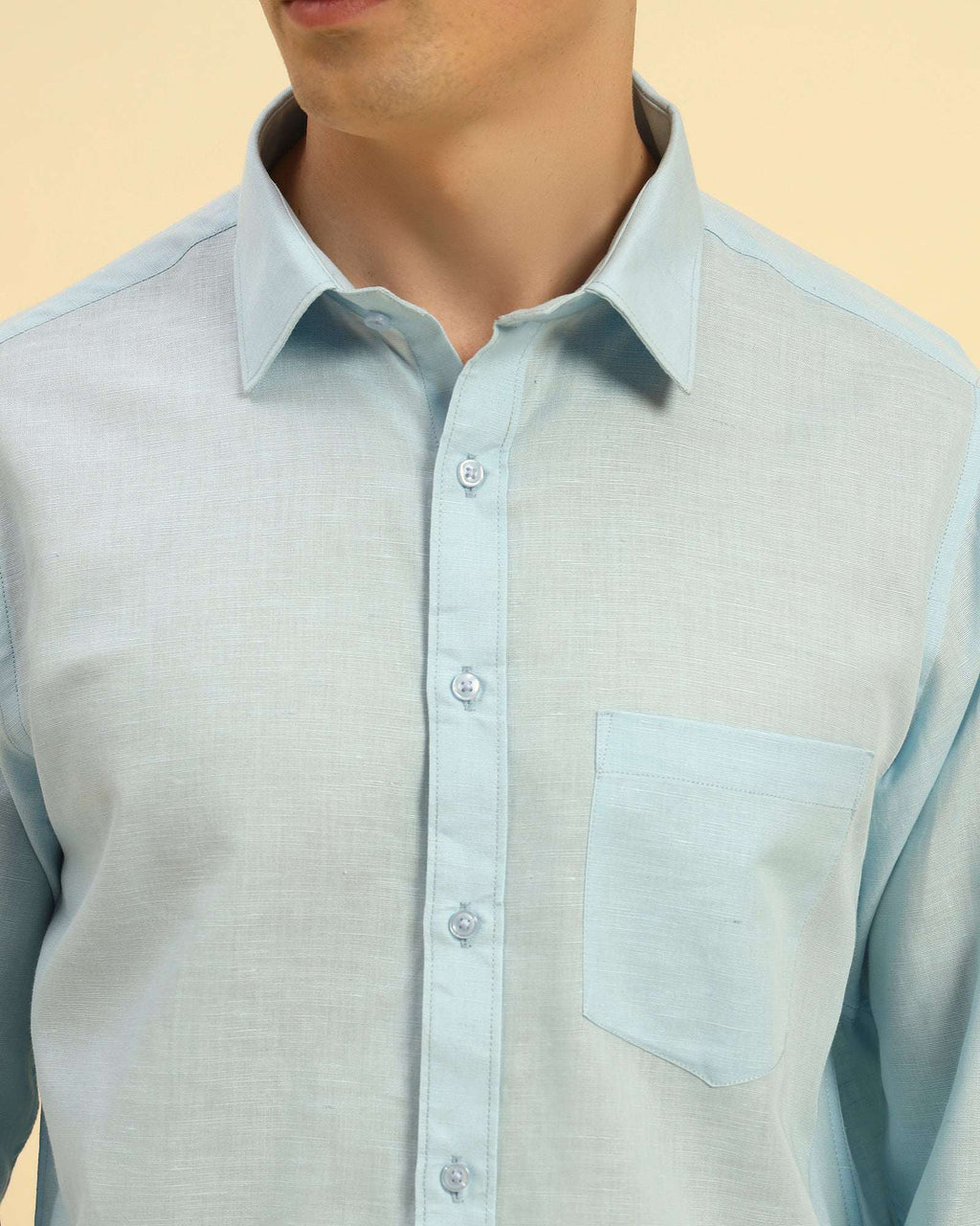 Close-up of the pointed collar and premium Italian cotton-linen fabric texture on the Aeternum Men's Sky Blue Shirt.