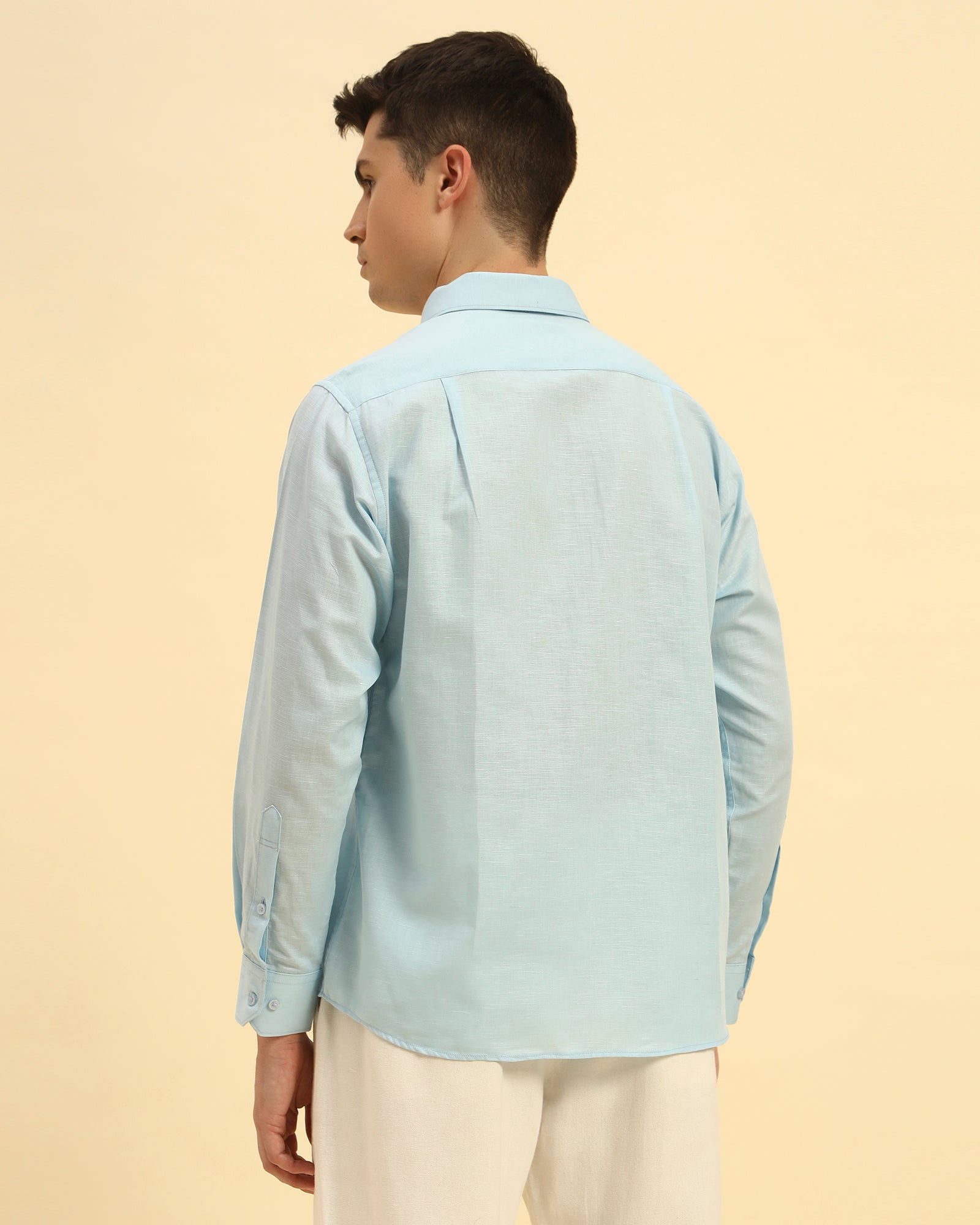 Back view of the Aeternum Men's Relaxed Fit Italian Cotton-Linen Shirt demonstrating the clean shoulder line and comfortable fit.