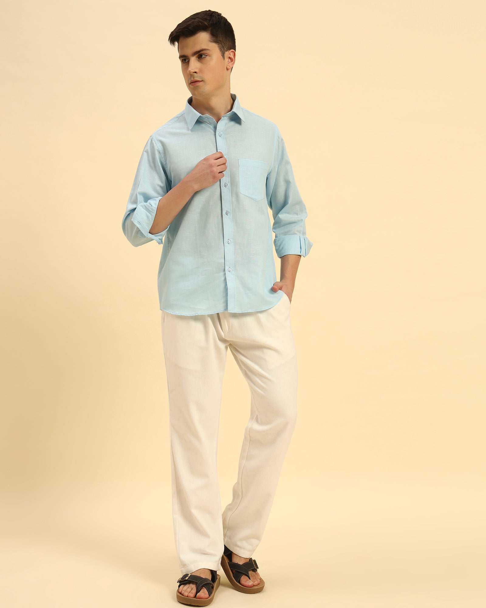 Full body view of the Sky Blue Aeternum Relaxed Fit Italian Shirt styled with white trousers for a fresh, sophisticated look