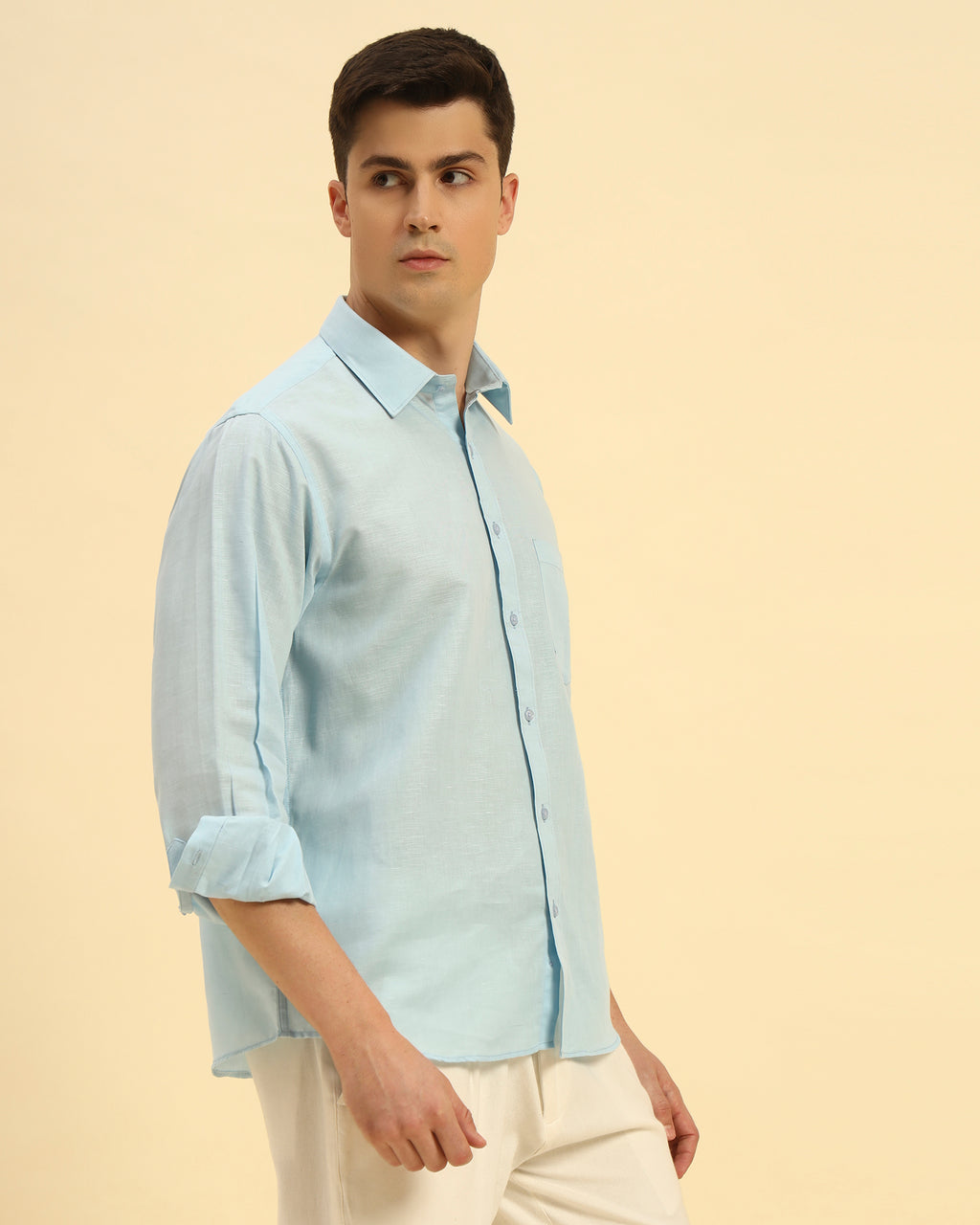 Three-quarter profile of the Men's Sky Blue Cotton-Linen Shirt highlighting the effortless drape and relaxed silhouette
