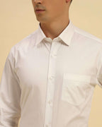 Close-up of the collar and signature textured fabric on the Aeternum Men's White Oxford Cotton Shirt.