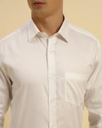 Close-up of the pointed collar and high-luster Giza cotton satin fabric on the Aeternum Men's White Shirt.
