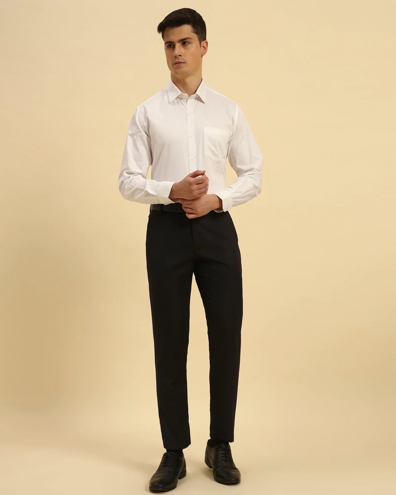 Full body view of the Aeternum Men's White Supima Cotton Shirt styled with black trousers for a formal look.